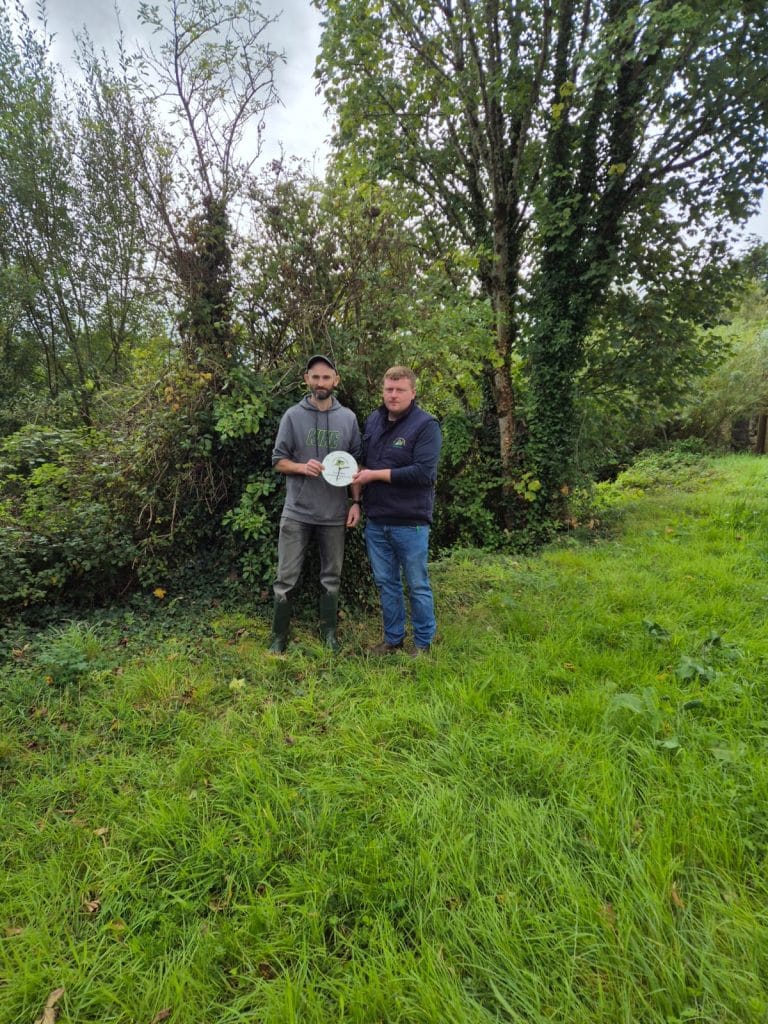 Scariff Mart Weanling Show and Sale Tony Kelleher Bodyke receiving his prize for the Best CH Heifer from Conor Nugent Clare Marts.